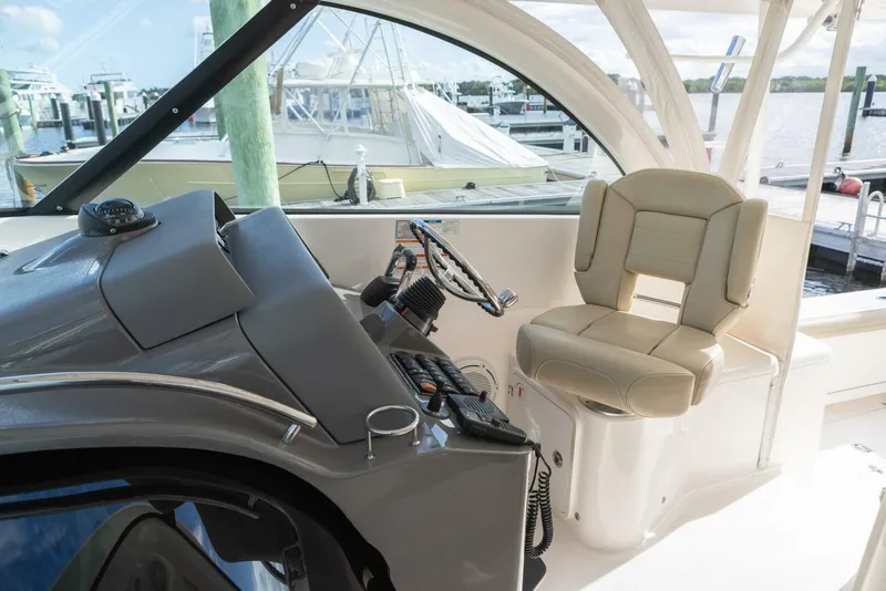 Slide: The Image of Pursuit 38 - TRACKER - Helm Chair 2018 Pursuit 38 Center Console TRACKER - 5725391