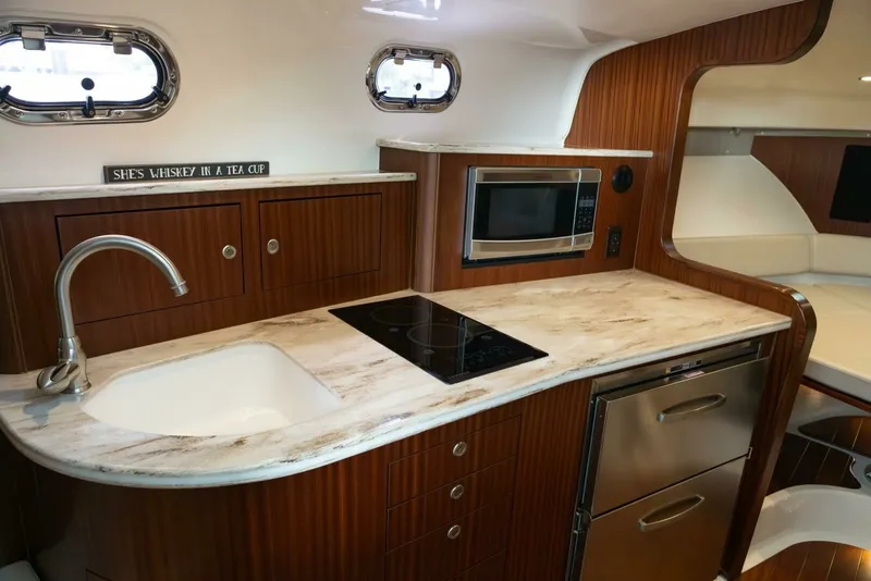 Slide: The Image of Pursuit 38 - TRACKER - Galley Counter 2018 Pursuit 38 Center Console TRACKER - 7680280