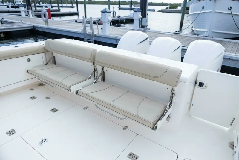Slide: The Image of Pursuit 38 - TRACKER - Cockpit Fold Down Seating 2018 Pursuit 38 Center Console TRACKER - 7680292