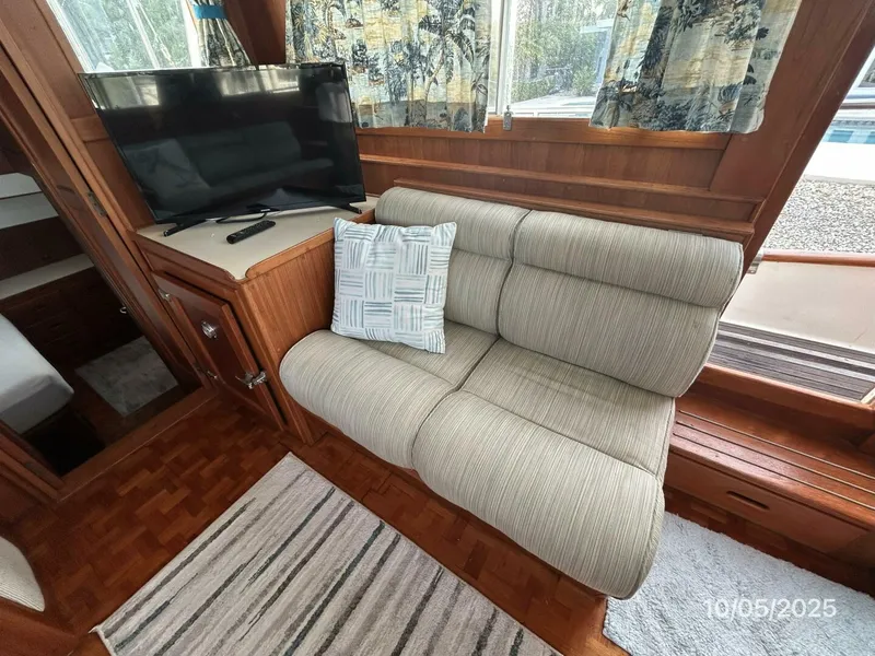 Slide: The Image of 42' Grand Banks salon port aft seating - 5726318