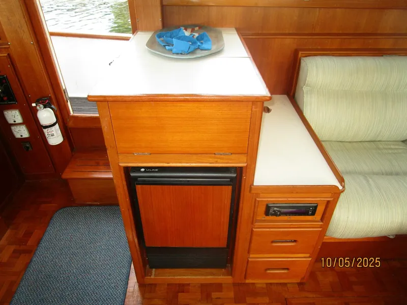 Slide: The Image of 42' Grand Banks salon starboard cabinetry - 5726320