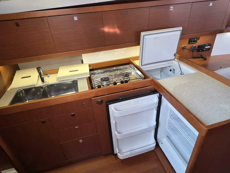 Slide: The Image of Galley w/ Double Sinks, Stove/Oven, Fridge, Freezer, Microwave - 5739416