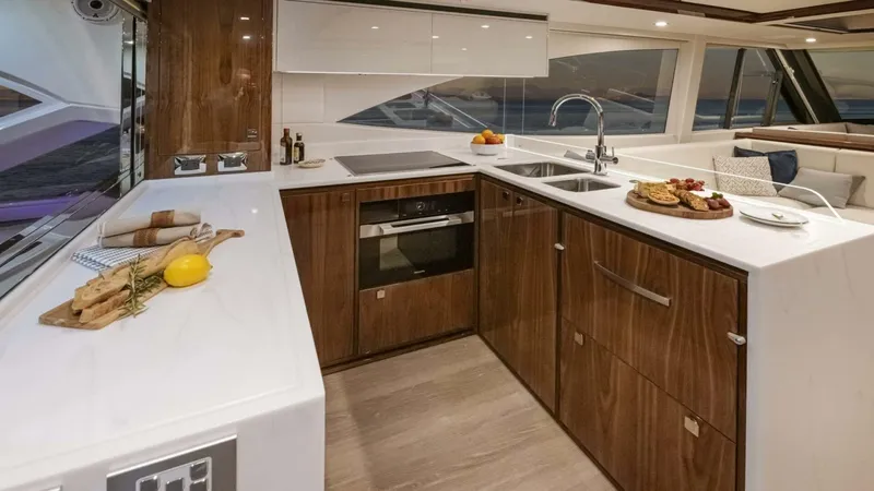 Slide: The Image of Riviera 6800 Sport Yacht PE Galley 01 Scaled (1) - 5755770