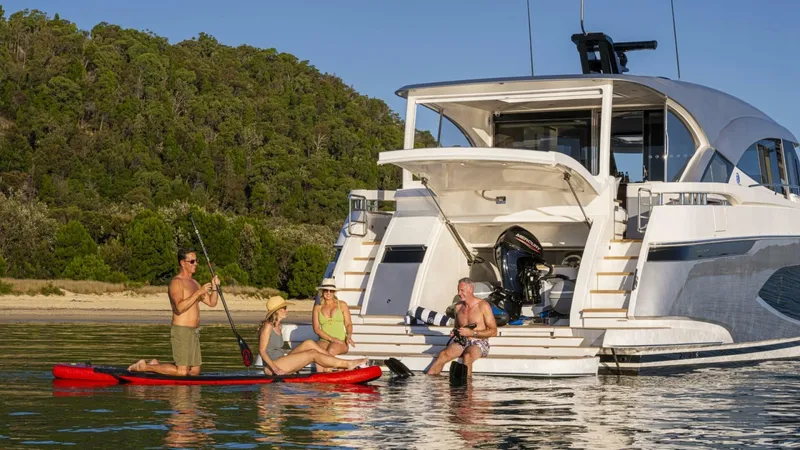 Slide: The Image of Riviera 6800 Sport Yacht PE Watersports Garage 01 Scaled - 5755774