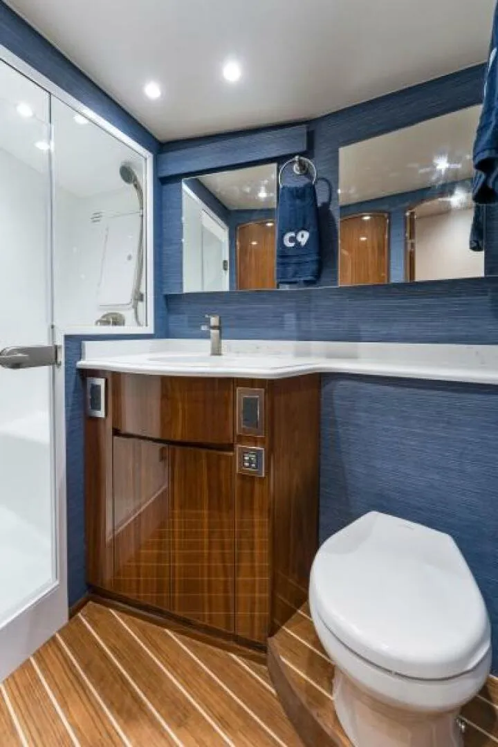 Slide: The Image of 2021 Viking 54 Convertible HAMMERHEADS Master Stateroom Head - 5755648