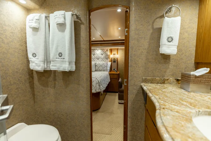 Slide: The Image of 2013 Viking 76 Convertible- REEL FIRE- Master Stateroom Head - 5763713