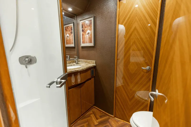 Slide: The Image of 2013 Viking 76 Convertible- REEL FIRE- Forward VIP Stateroom Head - 5763688