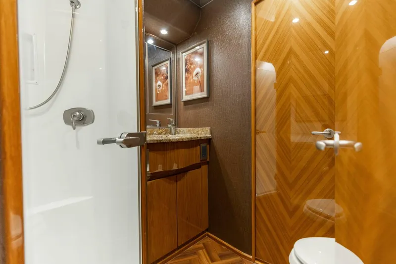 Slide: The Image of 2013 Viking 76 Convertible- REEL FIRE- Forward VIP Stateroom Head - 5763686