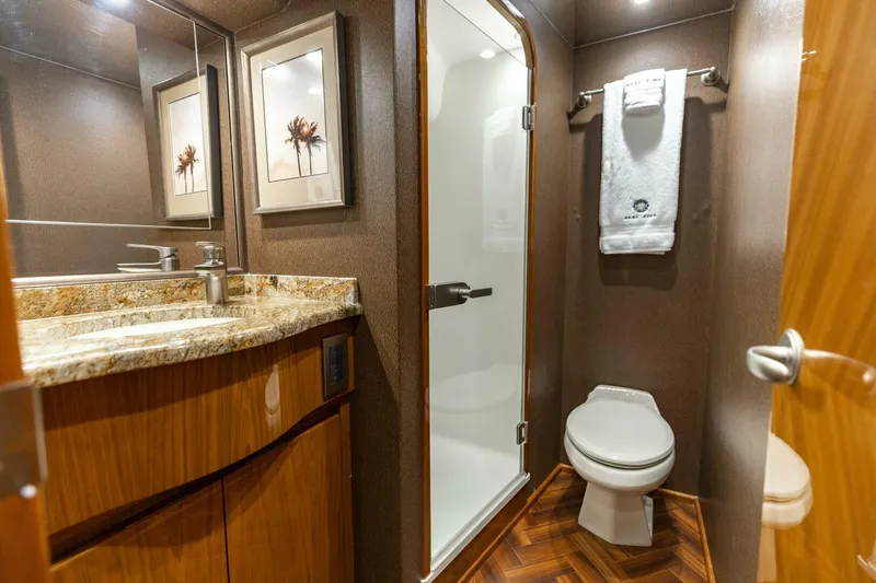 Slide: The Image of 2013 Viking 76 Convertible- REEL FIRE- Starboard Stateroom Head - 5763675