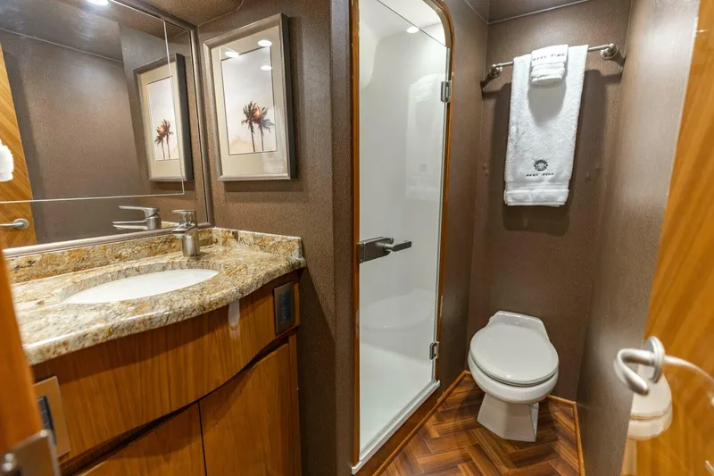 Slide: The Image of 2013 Viking 76 Convertible- REEL FIRE- Starboard Stateroom Head - 5763676