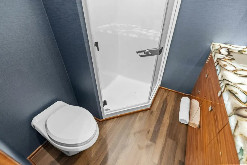 Slide: The Image of 2026 Viking 82 Convertible- TEAM HARVEY I- Master Stateroom Head - 5771099