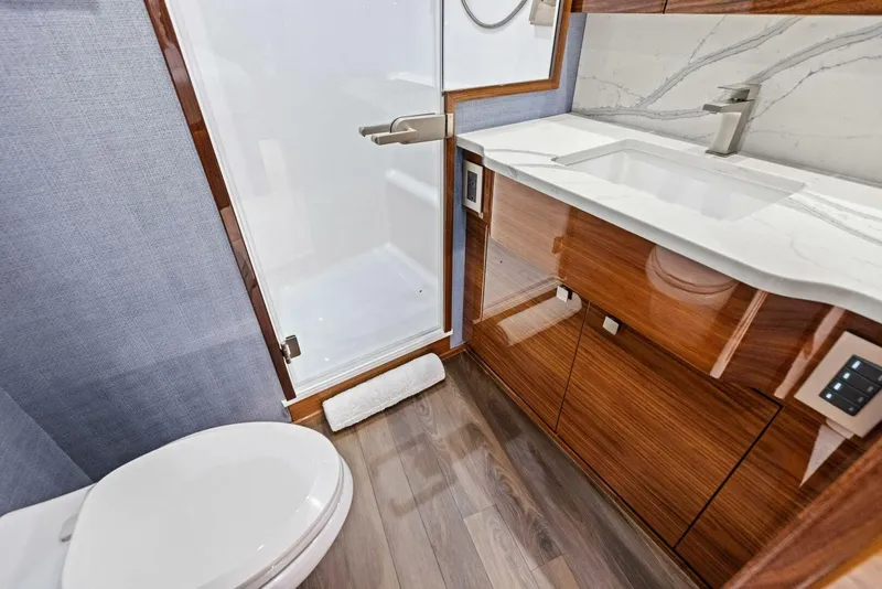 Slide: The Image of 2026 Viking 82 Convertible- TEAM HARVEY I- STBD Guest Sateroom Head - 5771070