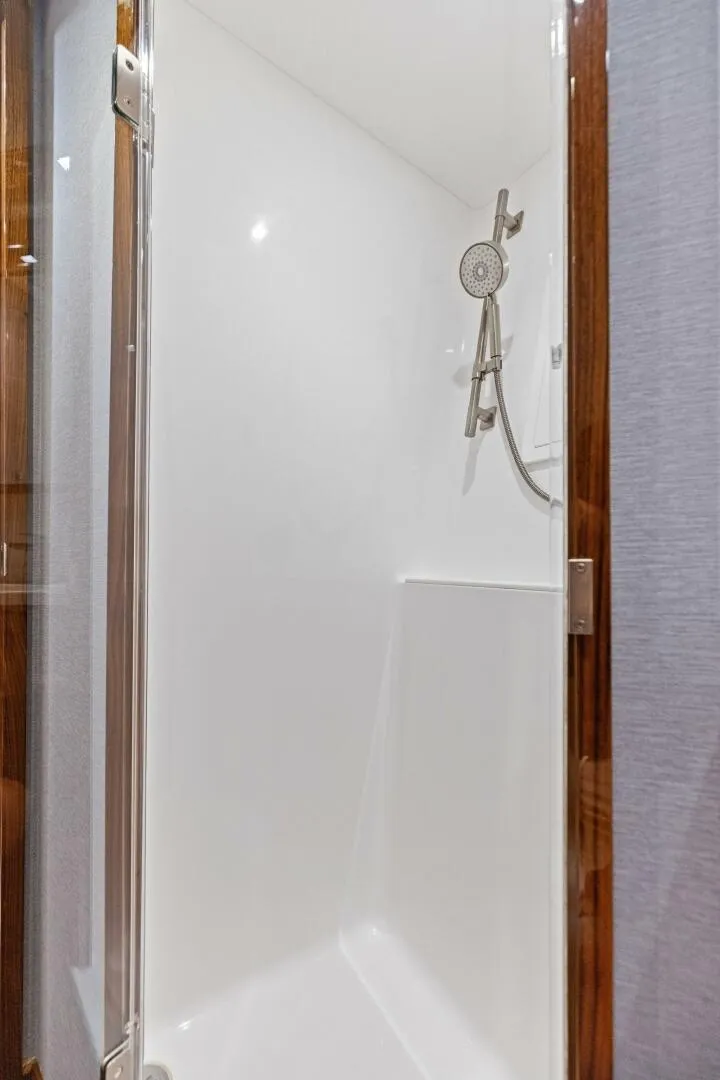 Slide: The Image of 2026 Viking 82 Convertible- TEAM HARVEY I- Port Stateroom Head - 5771059