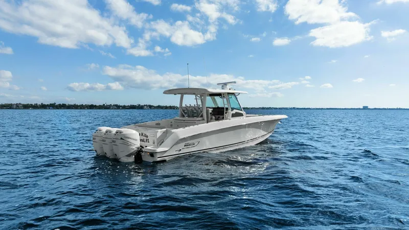 Slide: The Image of 2019 Boston Whaler 380 Outrage 'Lima Kilo' - Profile Stern 3/4 Starboard - 5788003