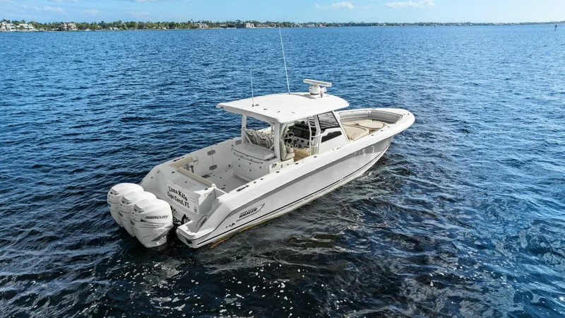 Slide: The Image of 2019 Boston Whaler 380 Outrage 'Lima Kilo' - Profile Stern 3/4 Starboard - 5788007