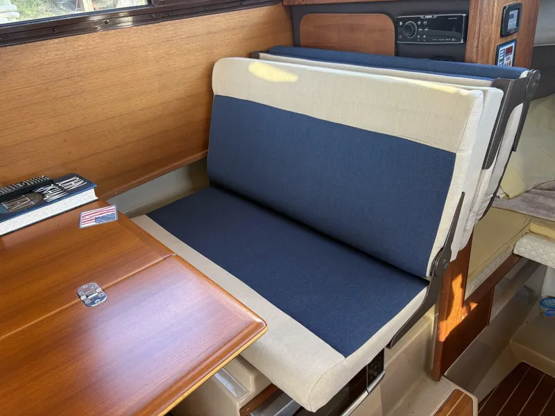 Slide: The Image of Ranger Tug R-27 Seat reverses for dinette  - 5801105