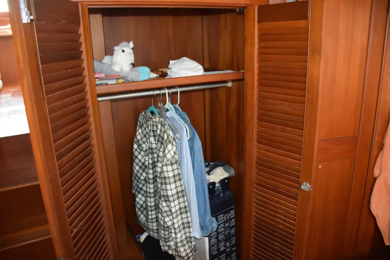 Slide: The Image of Master stateroom closet is forward to the center of the room - 5805850