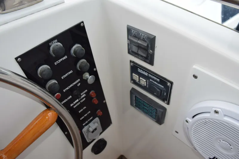 Slide: The Image of Flybridge Alarm panel, engine start/stops, trim tab control, Naiad stabilizer panel - 5805882