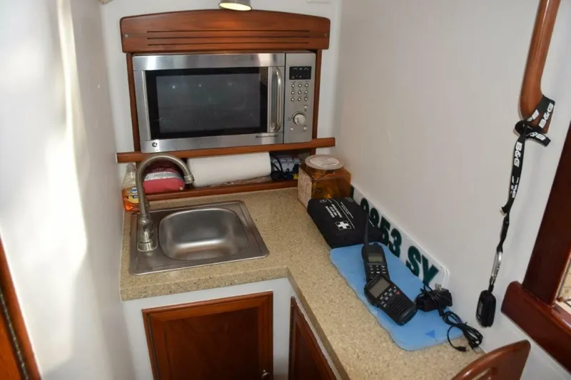 Slide: The Image of Galley Area To Starboard, Corian Countertop, Stainless Steel Sink - 5806585