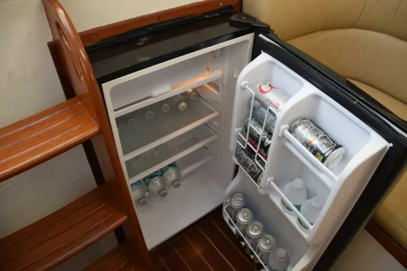 Slide: The Image of Mini Fridge With Small Freezer Section On Top - 5806588