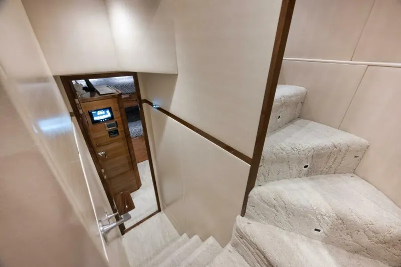 Slide: The Image of 2024 Viking 68 Convertible- GYS TRADE- Companionway to Crew Qtrs - 5812262
