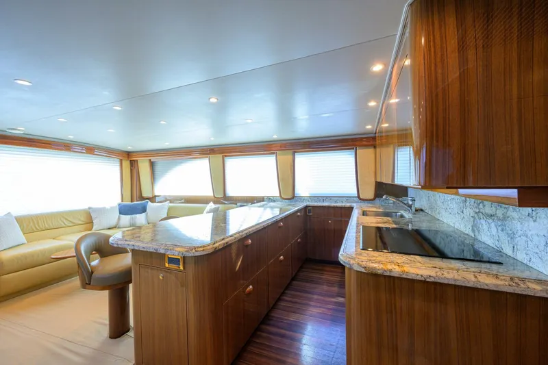 Slide: The Image of Galley With Rosewood Laminate Flooring And SubZero Drawers - 5817860