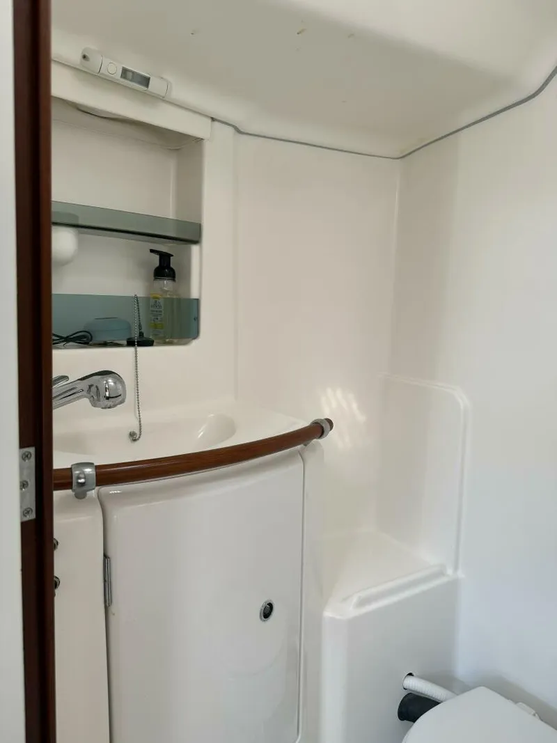 Slide: The Image of Water Closet Round wash basin with hot and cold mixer tap and shower - 5822408