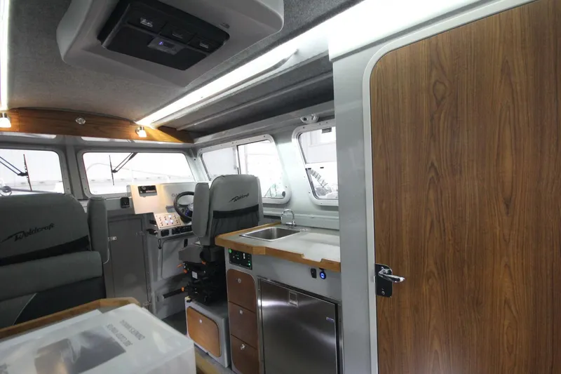 Slide: The Image of Weldcraft 300 Cuddy King OS and Custom 15k trailer 2025 - 5843847