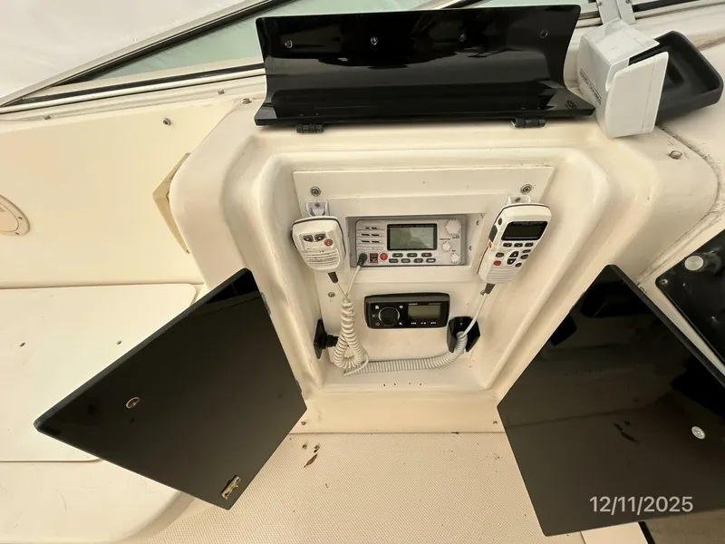 Slide: The Image of 47' Bayliner flybridge helm electronics locker - 5852213