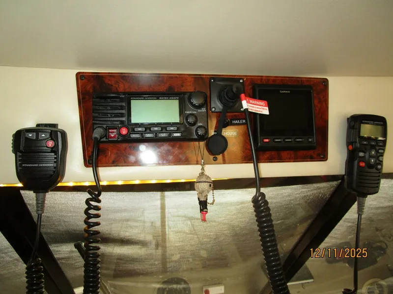 Slide: The Image of 47' Bayliner pilothouse helm overhead electronics - 5852244