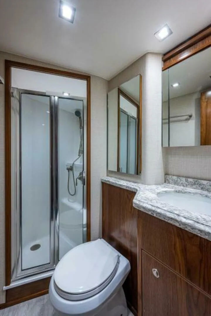 Slide: The Image of Viking 68 KEMOSABE - Forward Stateroom Head 2022 Viking 68 Convertible KEMOSABE - 5845913