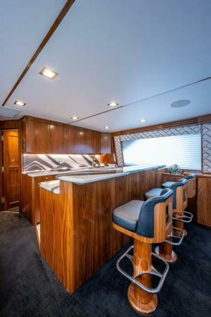Slide: The Image of Viking 68 KEMOSABE - Galley & Bar Stools 2022 Viking 68 Convertible KEMOSABE - 5845899