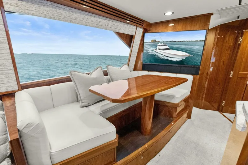 Slide: The Image of 2022 Viking 68 Enclosed Bridge- PIPE DREAM- Dinnette - 5922370