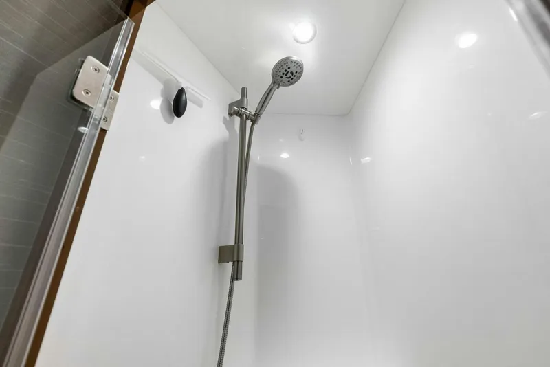 Slide: The Image of 2022 Viking 68 Enclosed Bridge- PIPE DREAM- Forward Stateroom Head - 5922365