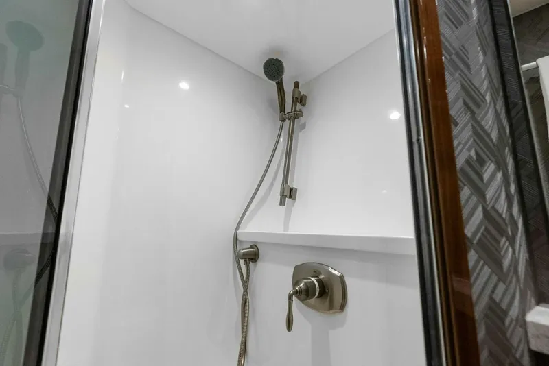 Slide: The Image of 2022 Viking 68 Enclosed Bridge- PIPE DREAM- Forward Stateroom Head - 5922359