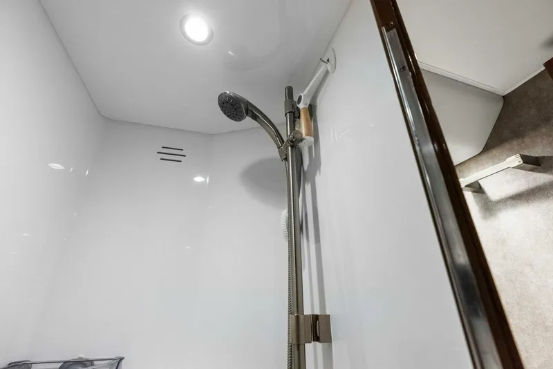 Slide: The Image of 2022 Viking 68 Enclosed Bridge- PIPE DREAM- Crew Stateroom Head - 5922345