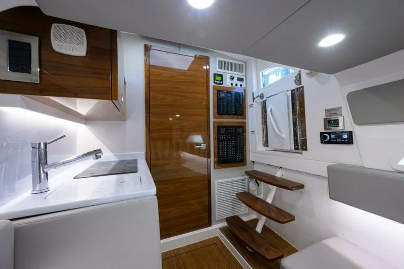 Slide: The Image of Valhalla 46 - Cabin Entrance & Galley 2022 Valhalla 46 Center Console - 5855429