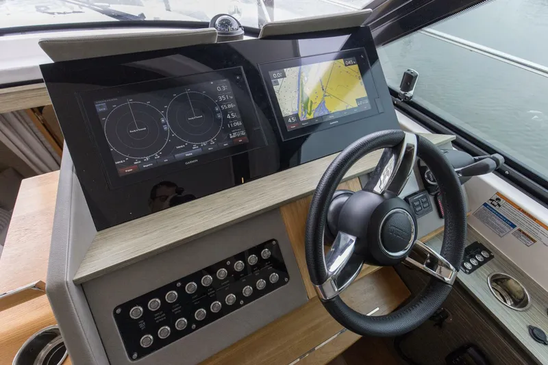 Slide: The Image of 2019 Tiara Yachts C49 Coupe Helm Controls And Electronics - 5883485