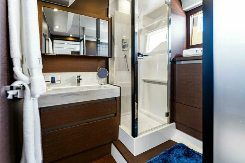 Slide: The Image of 2019 63 Prestige Flybridge - RT Time - Master Stateroom Head - 5883960