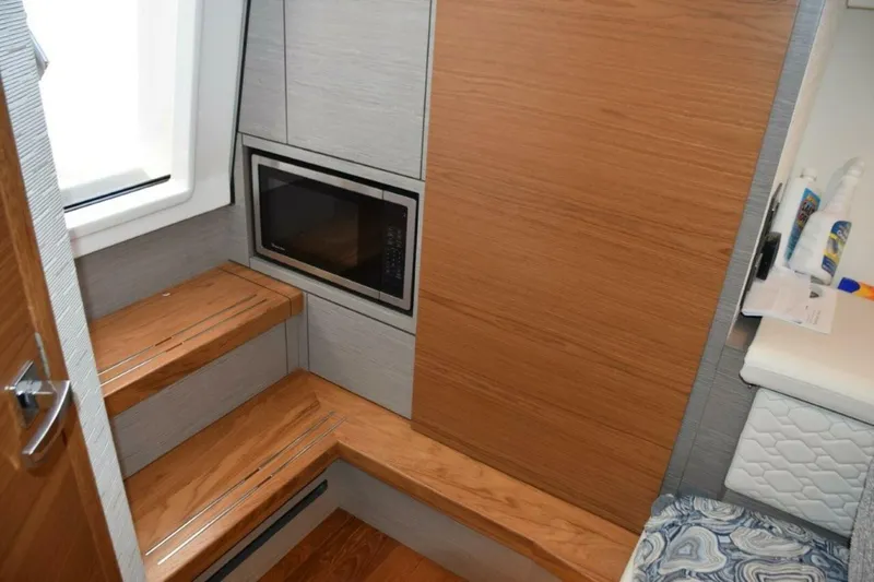 Slide: The Image of Wood Cabin Entry Steps And Sole. Microwave Oven   Electrical Panel Behind Door - 5903778