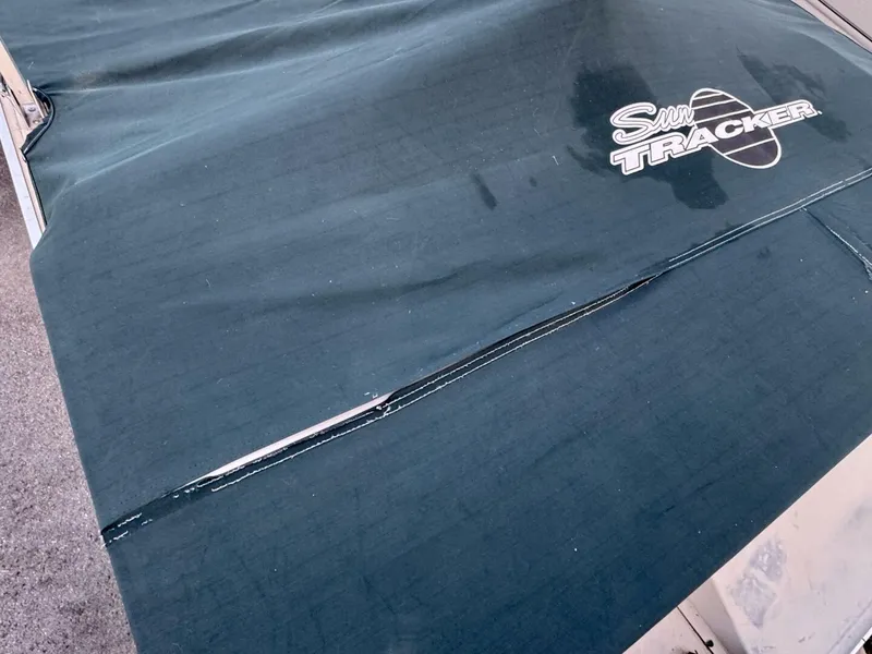 Slide: The Image of Sun Tracker Party Deck 21 2002 - 5987953