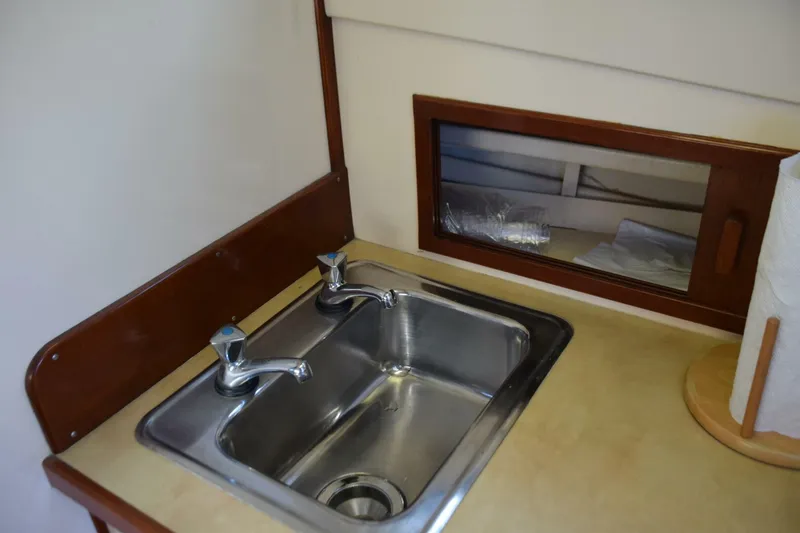 Slide: The Image of Stainless Sink And Storage Behind - 5911846