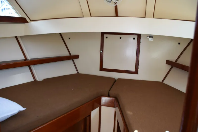 Slide: The Image of Shelves And Reading Lights In V Berth, Trimmed With Teak In Herreshoff Styling - 5911850