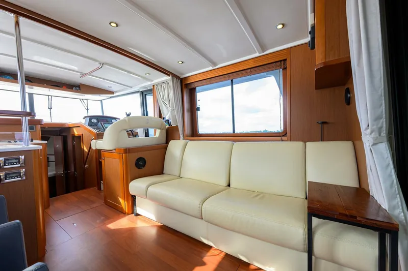 Slide: The Image of Beneteau 44 Stellar Seascape - Salon, Port and Starboard Seating 2014 Beneteau 44 Swift Trawler - 5908955