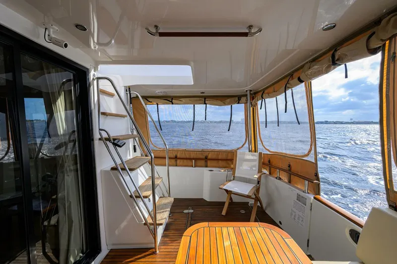 Slide: The Image of Beneteau 44 Stellar Seascape - Aft Deck, Dining, Seating, Stairs to Bridge 2014 Beneteau 44 Swift Trawler - 5908989