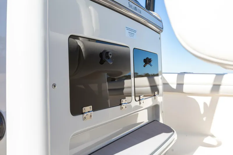 Slide: The Image of Shearwater 260 SS Carolina  Aft Console Compartments Foot Rest - 5923929