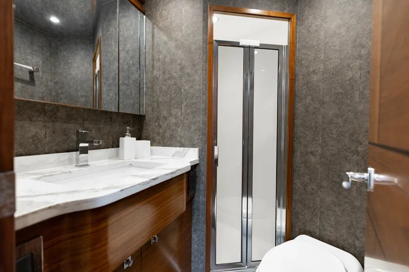 Slide: The Image of 2023 Viking 72 Convertible- TEAM SUPREME- Forward Stateroom Head - 6096831