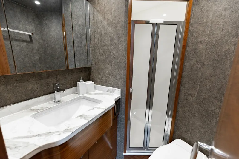 Slide: The Image of 2023 Viking 72 Convertible- TEAM SUPREME- Forward Stateroom Head - 6096832