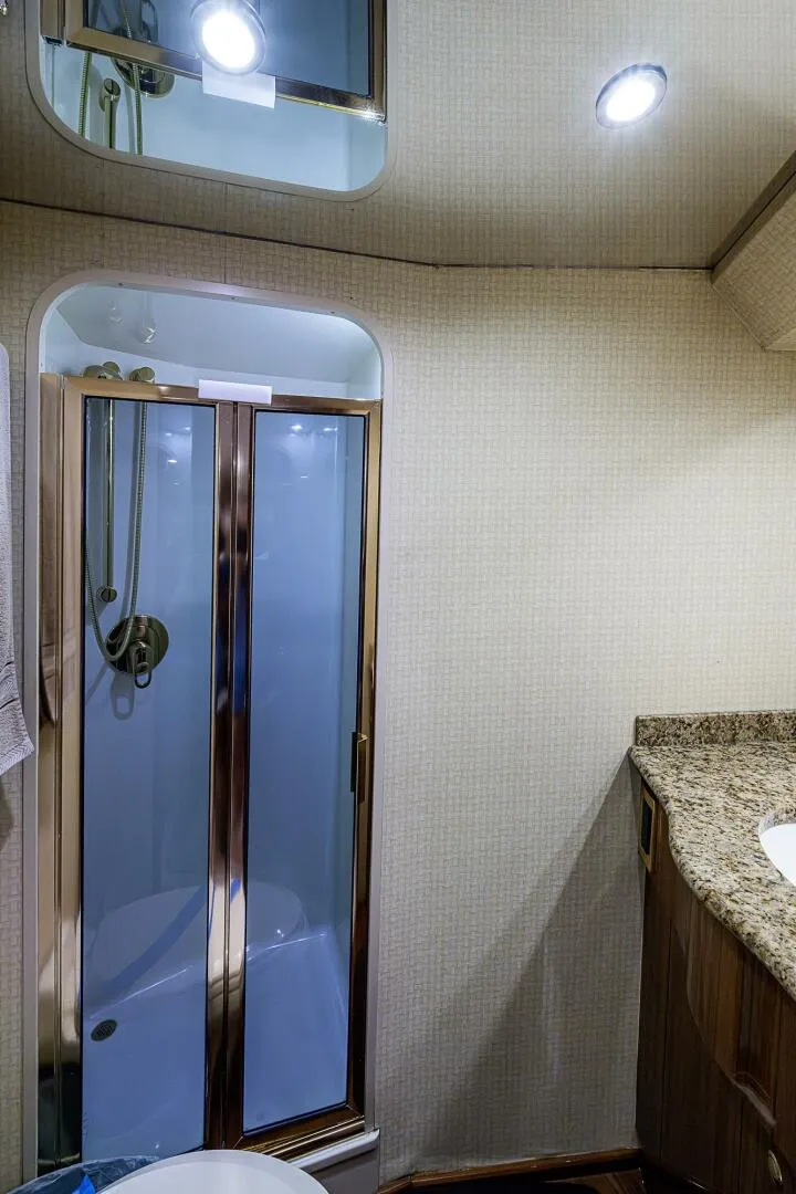 Slide: The Image of Viking 64 - Big Blue - Forward Stateroom Head 2007 Viking 64 Convertible - Big Blue - 5929051