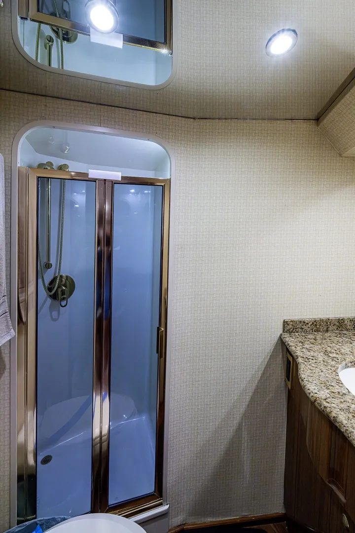 Slide: The Image of Viking 64 BIG BLUE - VIP Guest Stateroom Ensuite Head 2007 Viking 64 BIG BLUE - 7288558